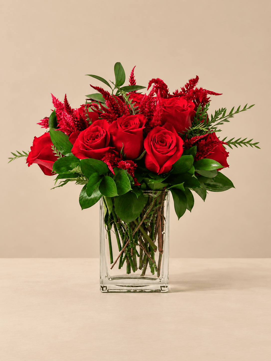 A Heavy Glass Vase of South American Roses